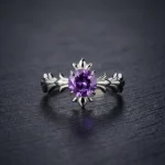 "AAA-grade natural oval amethyst in a vintage Victorian-style sterling silver filigree adjustable ring setting."