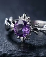 "AAA-grade natural oval amethyst in a vintage Victorian-style sterling silver filigree adjustable ring setting."
