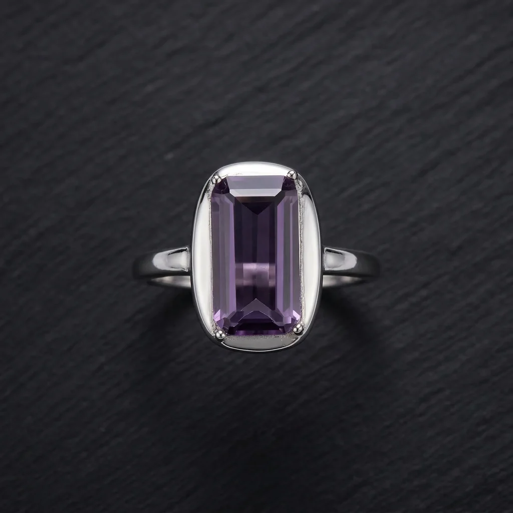 Classic Amethyst Solitaire Ring featuring a brilliant-cut natural purple gemstone in a vintage-textured 925 sterling silver adjustable setting.