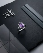 Classic Amethyst Solitaire Ring featuring a brilliant-cut natural purple gemstone in a vintage-textured 925 sterling silver adjustable setting.