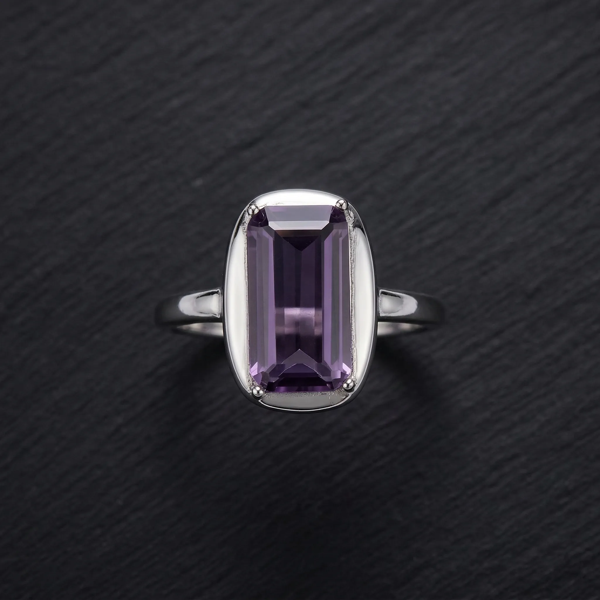 Classic Amethyst Solitaire Ring featuring a brilliant-cut natural purple gemstone in a vintage-textured 925 sterling silver adjustable setting.
