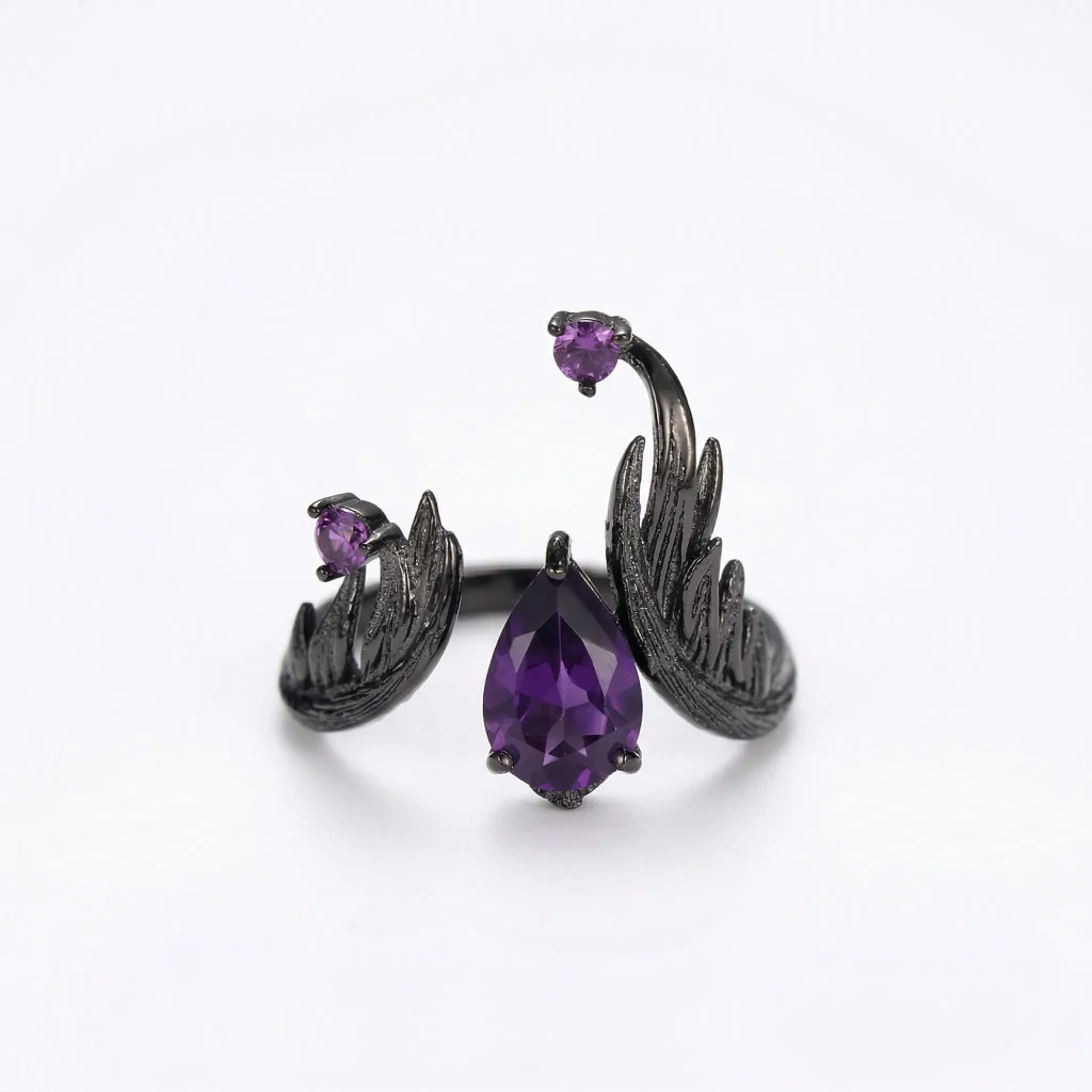 Top view of the 'Dark Renaissance' Dark Aesthetic Amethyst Ring, showcasing the deep violet amethyst secured by complex black rhodium Italian filigree work.