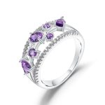 Angled side profile of the Luxury Amethyst and Sapphire Ring, revealing the multi-layered S925 sterling silver bands and the secure multi-prong gemstone setting.