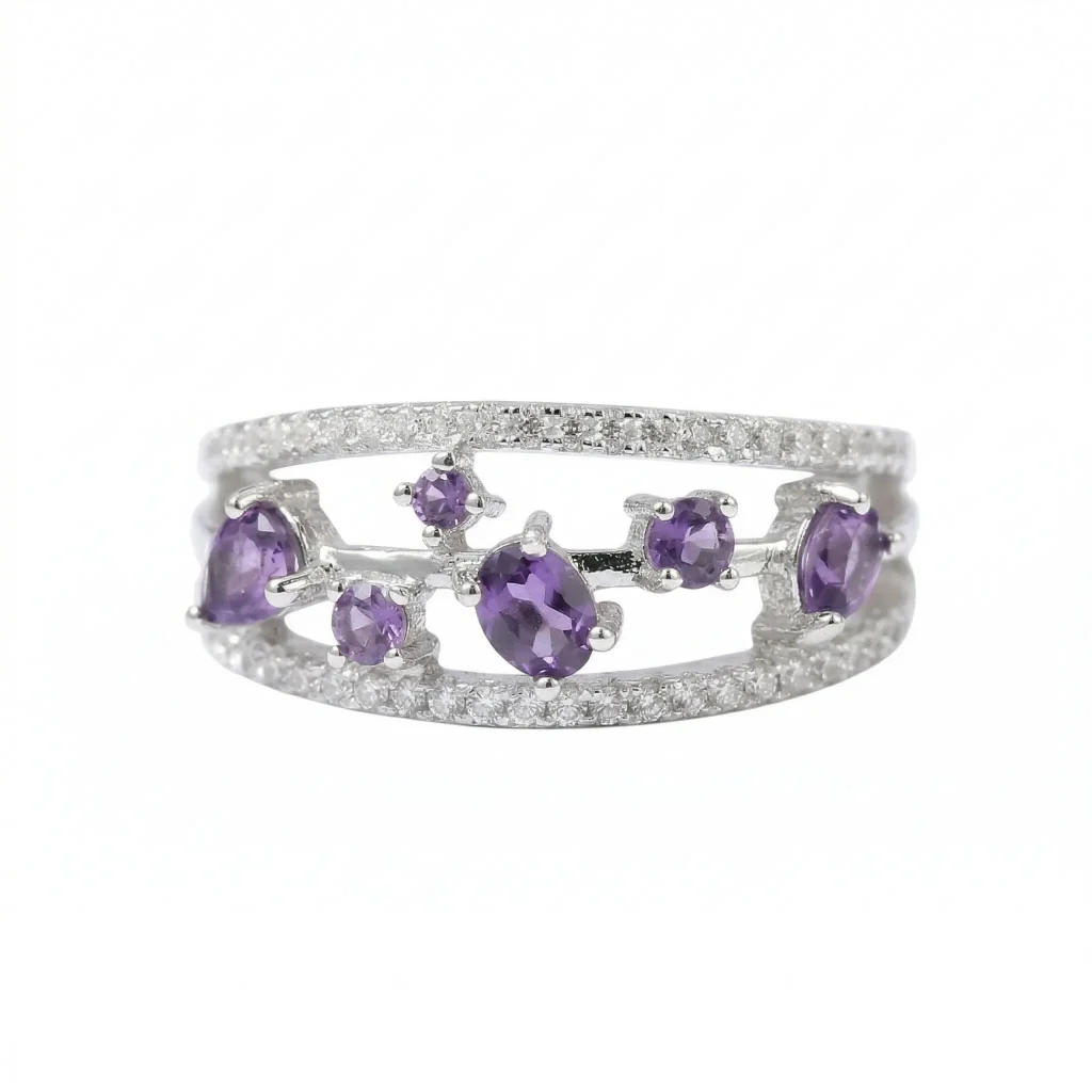 Frontal view of the Luxury Amethyst and Sapphire Ring 'Flourish' Masterpiece, showcasing the unique botanical branch-style setting and vibrant natural violet gemstones.