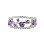 Frontal view of the Luxury Amethyst and Sapphire Ring 'Flourish' Masterpiece, showcasing the unique botanical branch-style setting and vibrant natural violet gemstones.
