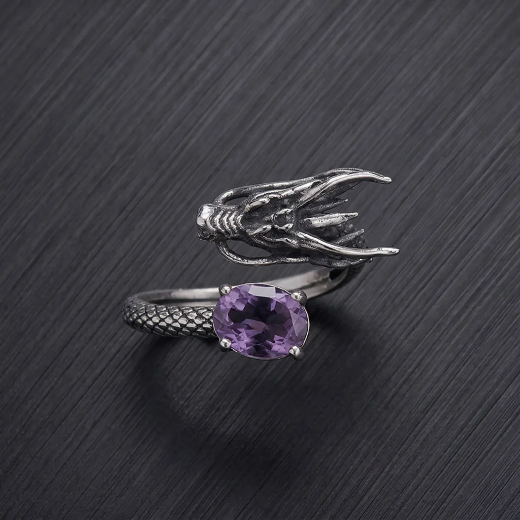 Majestic Geometric Amethyst Ring featuring a natural cushion-cut stone and an intricate oxidized 925 silver dragon scale band.