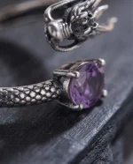 Majestic Geometric Amethyst Ring featuring a natural cushion-cut stone and an intricate oxidized 925 silver dragon scale band.