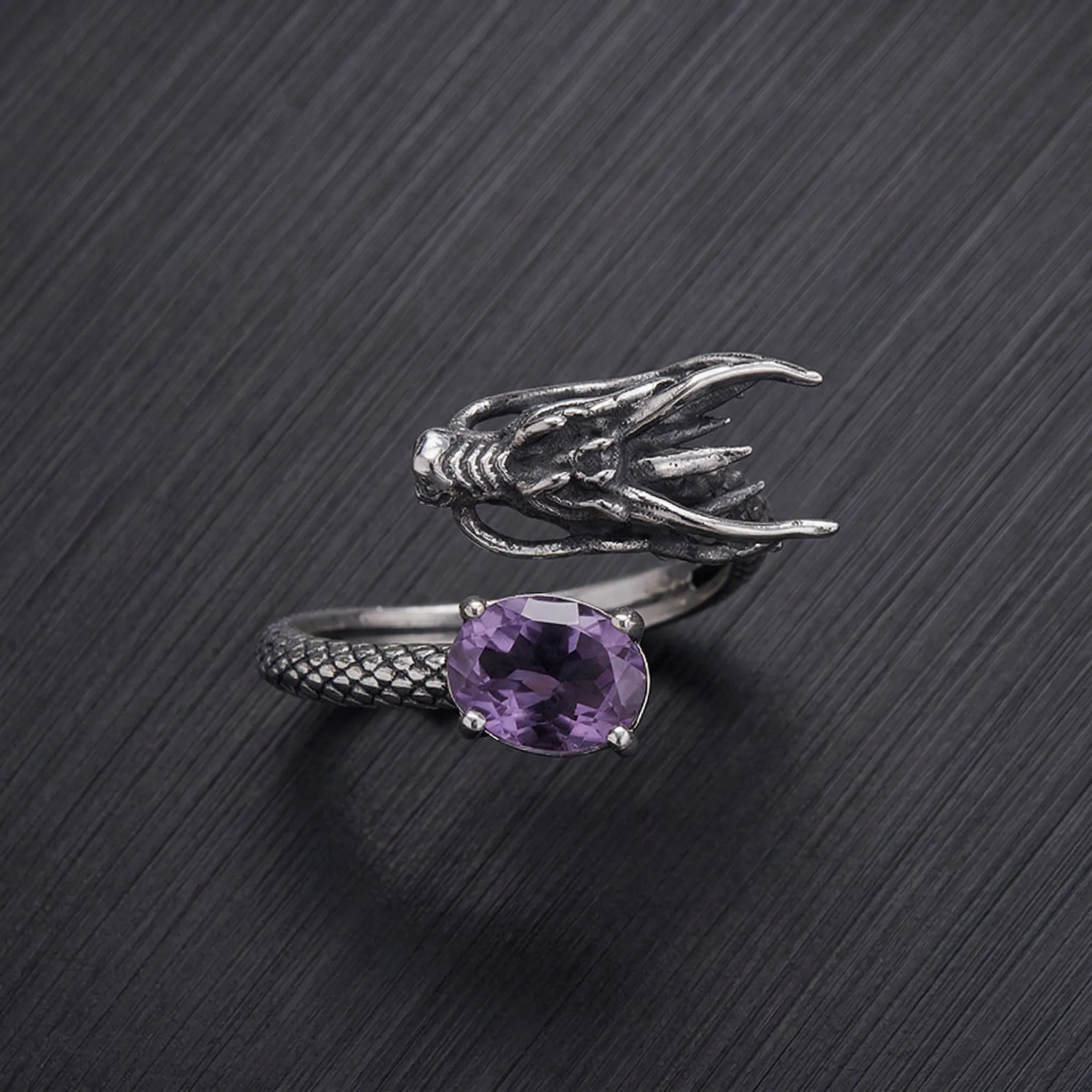 Majestic Geometric Amethyst Ring featuring a natural cushion-cut stone and an intricate oxidized 925 silver dragon scale band.