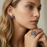 Alternative view of the Heirloom Amethyst Ring on a model, showcasing the artistic synergy with matching gemstone earrings for a complete royal look.