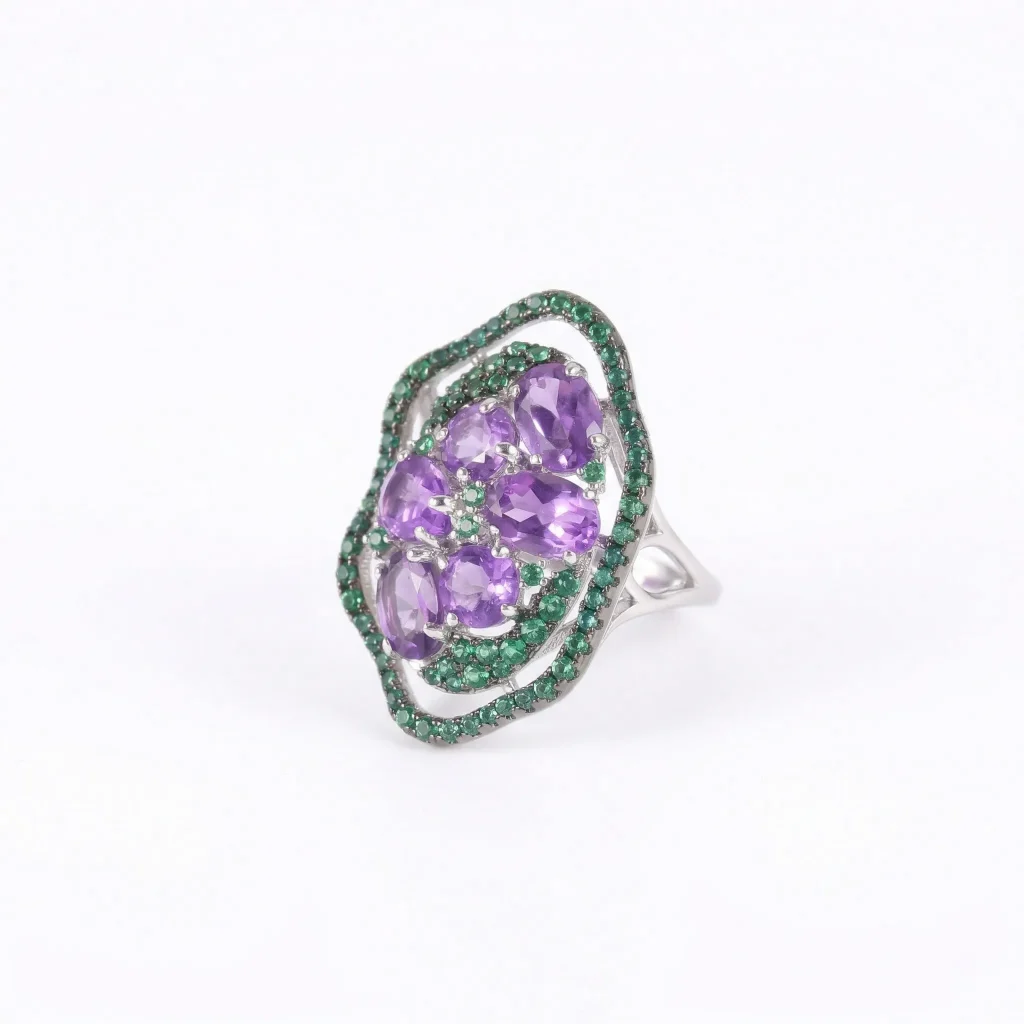 The Grand Sovereign Heirloom Amethyst Ring in 925 silver, showcasing the massive AAA natural amethyst cluster and vibrant green halo.