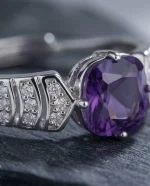 Stunning Minimalist Amethyst Ring featuring a natural cushion-cut violet stone in a dainty S925 sterling silver adjustable stackable band.