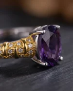 Modernist Amethyst Ring featuring a natural oval crystal elevated in a high-prong 925 sterling silver adjustable setting.