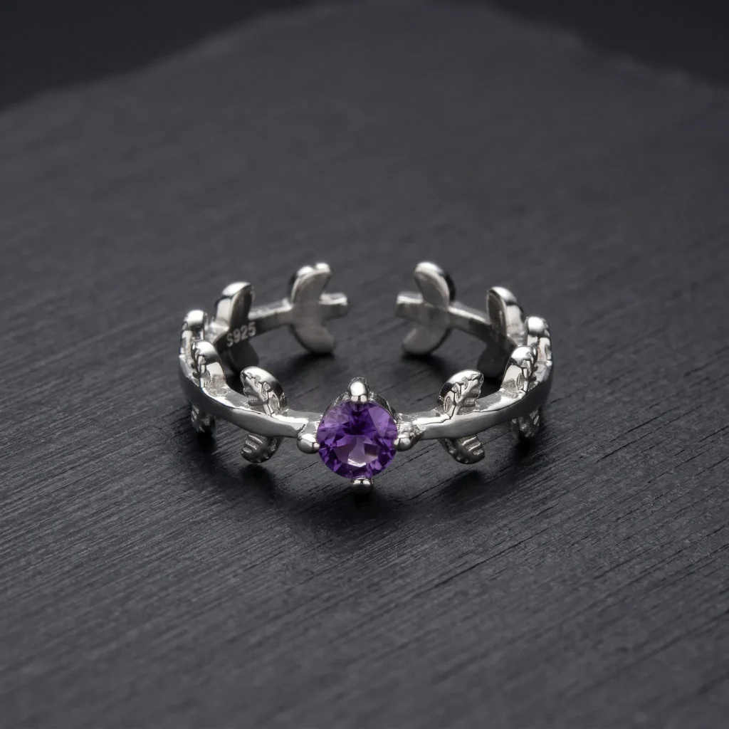 Deep royal purple natural amethyst solitaire ring featuring a classic four-prong 925 sterling silver adjustable setting.