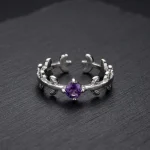 Deep royal purple natural amethyst solitaire ring featuring a classic four-prong 925 sterling silver adjustable setting.