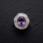 High-End Amethyst Ring 'The Empress' showing the massive AAA Siberian gemstone in a vintage S925 silver setting on a dark reflective surface.