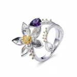 Zenith Lotus Amethyst Ring in handcrafted 925 sterling silver with a pear-cut natural purple gemstone heart.